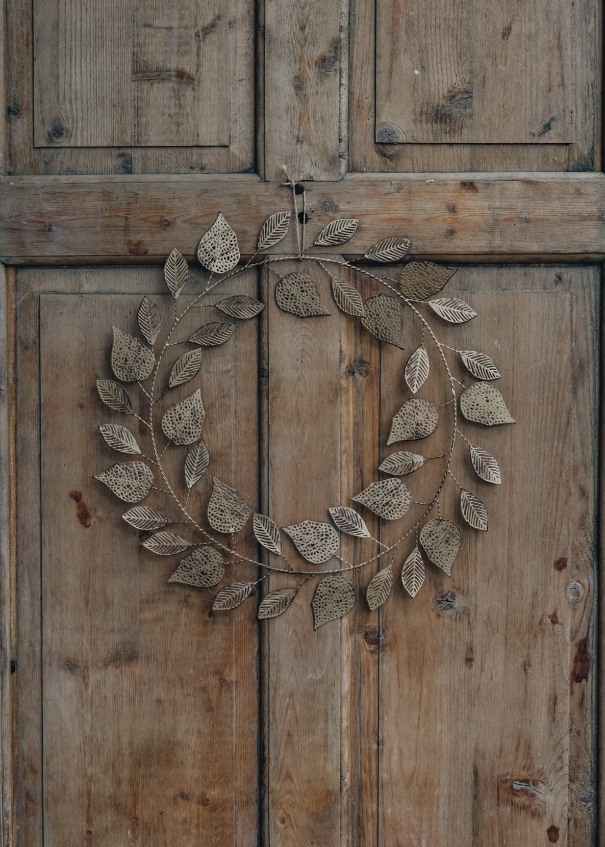 Nkuku Charita Wreath in Antique Brass