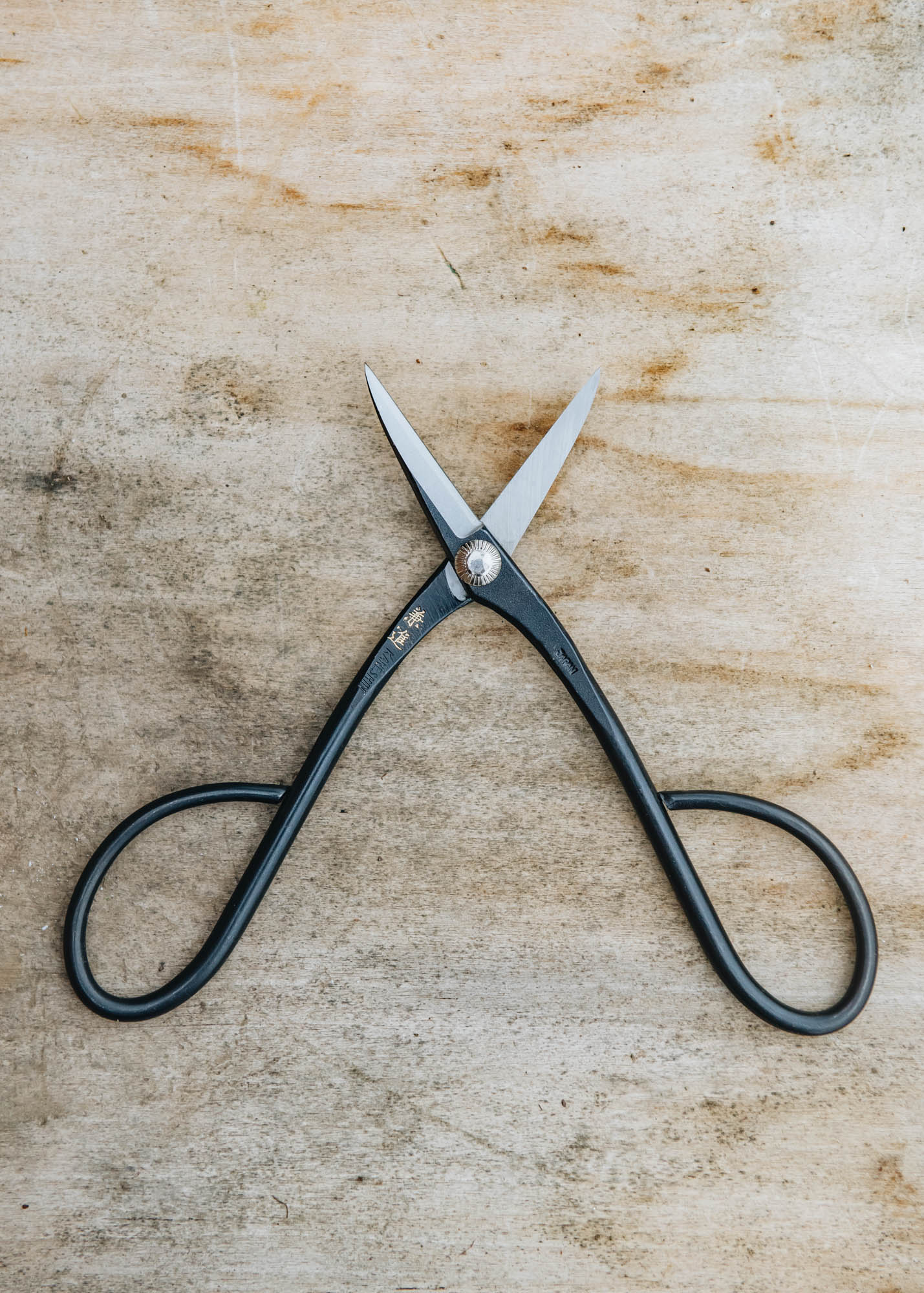 Trimming deals scissors meaning